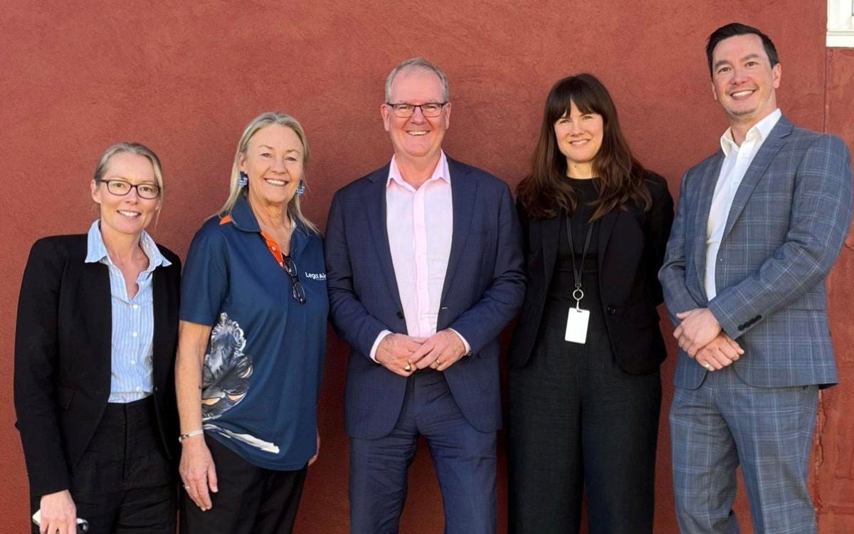 NSW Attorney General (centre) poses with DRLS and Legal Aid NSW staff at the Lismore office.